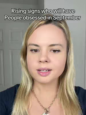 The cover image is a selfie-style shot of a woman with blonde hair. Above her head is a text overlay that reads: "Rising signs who will have People obsessed in September." She is looking directly at the camera with a slight smile, and a gold chain necklace is visible. The background is a plain white wall with a door visible.
