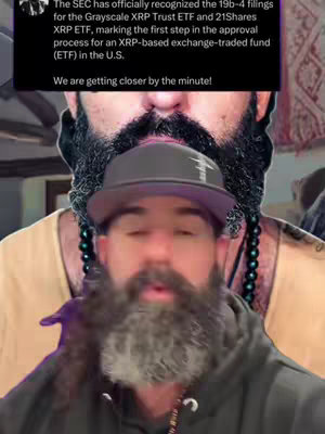 The image features a man in a hoodie and a hat, with a beard, speaking directly to the camera. There's a superimposed text box detailing XRP ETF filings, and the background features another, blurred image of a man's face.