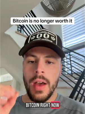 A man with a beard and a black cap is speaking directly to the camera. Above him, the text "Bitcoin is no longer worth it". Below him, the text "BITCOIN RIGHT NOW" also is shown.