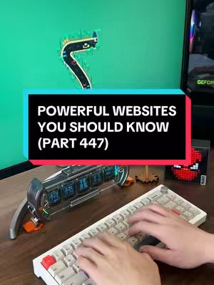 The cover image features a person typing on a white keyboard, with a screen or monitor visible in the background. In the foreground, a section of a mechanical keyboard is shown, with emphasis on the keys and the typing action. The background has a green screen and a small decorative element in the upper left that has a tiny road design. The bottom background is a table in a warm wooden tone, and there's an element mimicking a retro digital clock and a pixelated Spider-Man figure.