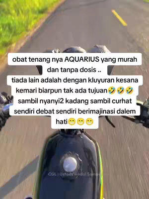 The image shows a first-person view of a person riding a motorcycle on a road. Text overlays are placed on the image. The general visual composition includes a focus on the road ahead with the handlebars of the motorcycle in view.