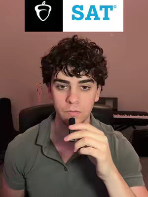 A young man with dark hair and a serious expression is centered in the frame. Above him, two logos are visible: The College Board's logo in white on a black square and the SAT logo. The background is softly lit, suggesting an indoor setting.