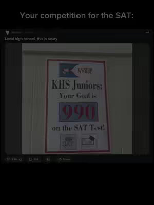 A sign on a wall with text about the SAT test and a score of 990. The background appears to be a hallway in a school.