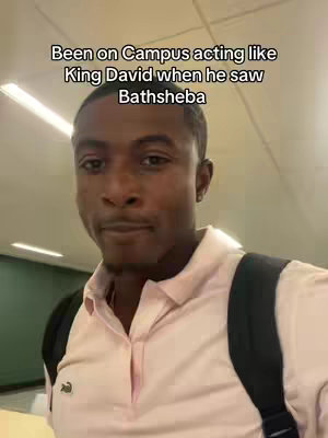 A medium shot shows a Black man in a pink collared shirt and a black backpack.  Text overlayed on the image reads, "Been on Campus acting like King David when he saw Bathsheba."