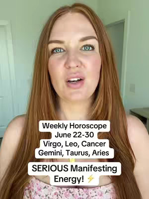 A selfie of a woman with long red hair and blue eyes, set in a bright, indoor environment. She is looking directly at the camera with her mouth slightly open, as if speaking. Overlayed on the image are white boxes with black text announcing a weekly horoscope for specific zodiac signs.