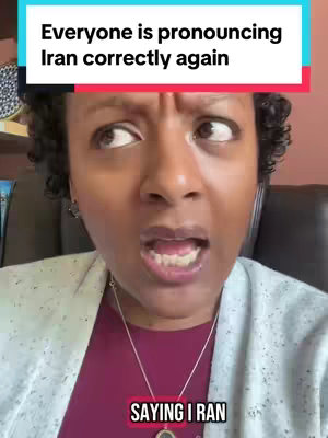 A woman with dark curly hair is looking upwards with a surprised expression. Text overlays at the top of the image read, "Everyone is pronouncing Iran correctly again," while another text box at the bottom read "SAYING I RAN."