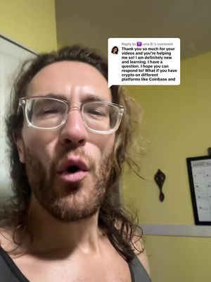 A selfie shot of a man with long, curly, light brown hair, and glasses is shown against a warm, yellow-toned background. He has a beard and is looking towards the camera with a slightly open mouth, as if he's speaking. A comment on a social media post is visible on the right side of the frame. The lighting is soft and natural.