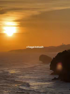 A scenic view of a sunset over the ocean with text overlay.