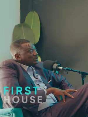 The image features a man in a blazer seated and speaking into a microphone. The background is a minimalist design with a dark wall and some green plant leaves. The words 'FIRST HOUSE' are overlaid at the bottom.