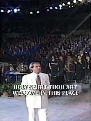The cover image shows a man in a white suit standing in front of a large crowd. The text overlayed on the image reads, "HOLY SPIRIT THOU ART WELCOME IN THIS PLACE."