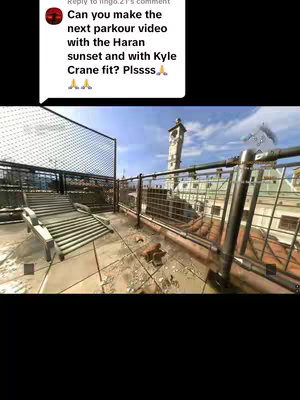 The image captures a first-person view from a rooftop, featuring a metal railing and an open area with stairs leading down. The background presents a city structure with a tall, clock-tower-like building. The sky is partly cloudy, complementing the urban scene and the muted color palette of the environment.
