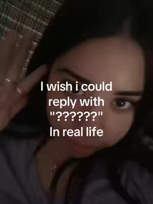 A close-up shot of a young woman looking at the camera, with overlaid text.
