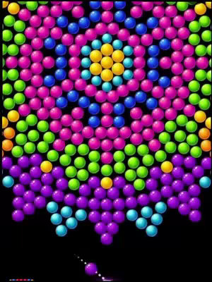 An image depicting a game screen with a grid of colorful bubbles against a black background. The bubbles are arranged in a pattern, and a single bubble is shown in the lower part of the image aiming towards the grid. Colors range from pink, green, yellow, blue, and purple, creating a visually engaging and dynamic composition.