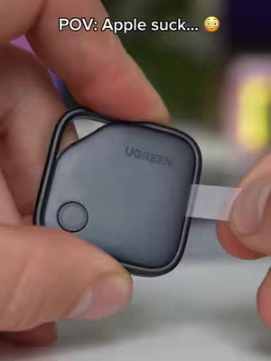 The cover image shows a person holding a black UGREEN smart finder device with the peel-off protective film, and the overlay text says "POV: Apple suck..." with an emoji.