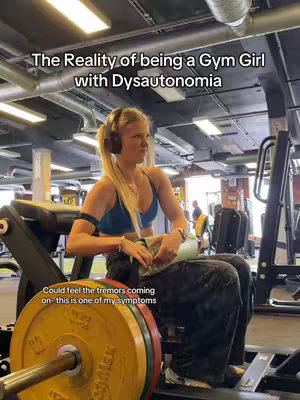 A woman with blonde hair sits on a weight machine in a gym, looking to the side. Text overlays the image. The background shows gym equipment and other people working out.
