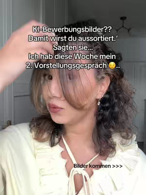 The cover image features a woman in a selfie-style shot. She is positioned with her head and shoulders visible, looking towards the left of the frame. The woman has long, wavy, dark hair, and is wearing a light-colored top. Text overlays are present, with the top one in white lettering, and the bottom saying "Bilder kommen >>>". The background suggests an indoor setting with a hint of a chandelier and wall detailing.