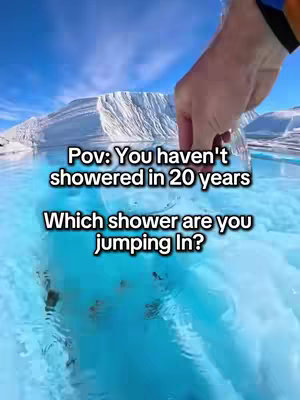 The image shows a first-person view of someone reaching towards a body of water, likely an icy lake or a pool in a snowy environment. The water has a striking blue hue. Text overlays the scene.