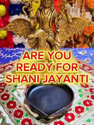 The image is a vertical composition featuring a golden statue of a deity with multiple arms and wings, set against a blurred background of colorful flowers. Overlayed on the image is red text, with a heart-shaped black bowl in focus at the bottom.