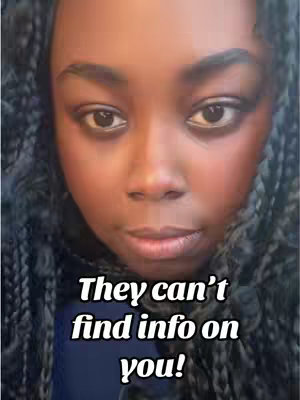 A close-up shot of a Black woman's face, framed by long, dark braided hair. Her eyes are the focal point, with a direct, serious gaze. The background is a blurred gradient of blue hues. Text overlayed reads 'They can't find info on you!'