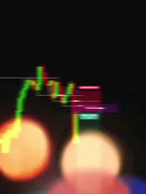 The cover image shows a blurred background with two large, out-of-focus orange circles, similar to bokeh. Superimposed over this are two intersecting trading chart lines in green and red, indicating price fluctuations of a stock. The overall composition leans towards technology or financial concepts, with a dark, blurred, and dynamic appearance.
