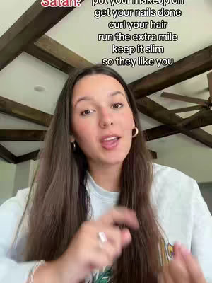 A woman with long brown hair stands in front of a ceiling. The hook text is in white, stacked vertically on the upper left side of the frame.