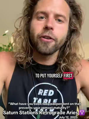 A man with wavy, long hair is centered in the frame speaking, wearing a black tank top with text, with a green leafy plant visible in the background. Overlay text in a red box states, "TO PUT YOURSELF FIRST". At the bottom, more text describes the video's content.