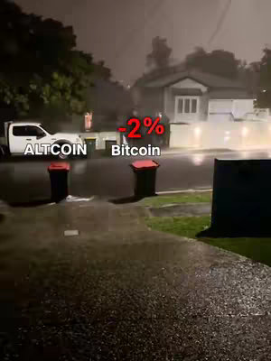 An outdoor scene under a stormy sky. The ground is wet, and a road with a white truck and some buildings are visible. Text overlays indicate information.