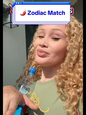 A young woman with curly blonde hair is holding a water bottle while looking towards to the left with subtle expression. A text overlay sits at the top of the image and additional elements include a light green t-shirt, a finger pointing down, and a light colored background.