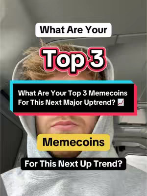 A selfie-style video cover image. The creator, a man with light hair, is centered in the frame. Above his head, the words 'What Are Your' are displayed in a white box. Bold, red text 'Top 3' sits below. A turquoise rectangle with white text reads, 'What Are Your Top 3 Memecoins For This Next Major Uptrend?'. Underneath, a yellow rectangle reads 'Memecoins', and at the bottom is a black rectangle with the text 'For This Next Up Trend?'.