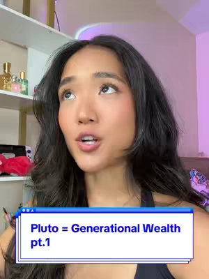 A young woman with dark hair is looking up, slightly to the right, with a subtle smile. She is wearing a black top, and the background includes a white shelf with perfume bottles and other items to the left. At the image's bottom, there is a blue box that says "Pluto = Generational Wealth pt.1".
