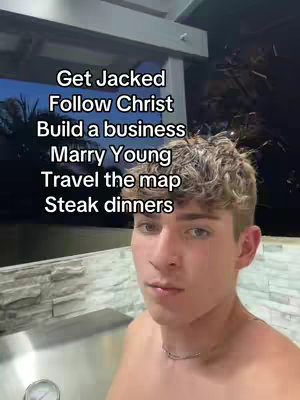 A young man with curly blond hair is centered in the frame. He's looking slightly towards the top right of the frame, with a hint of a slight smile on his face. Text overlays, in a sans-serif font, lists a set of goals. The background is dark with potential foliage or trees in the distance. The man is shirtless.