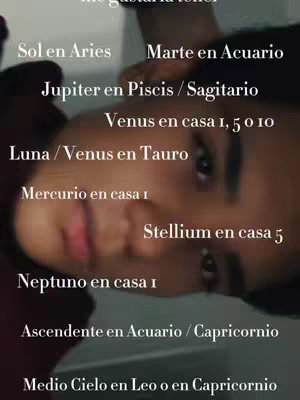A selfie-style shot featuring a person angled slightly towards the camera, with text overlays about their astrological chart, including Aries, Aquarius, and other signs. The person's face takes up most of the shot, with the text positioned around the face.