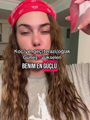 A woman with long wavy brown hair and a red bandana looks directly at the camera. Text overlays are placed on the cover image.