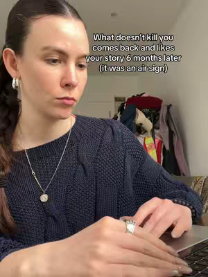 A woman sits in front of a laptop, looking thoughtful with text overlaid that reads, "What doesn't kill you comes back and likes your story 6 months later (it was an air sign)."