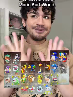 A man with dark hair smiles at the camera, gesturing toward multiple rows of Mario Kart character figurines displayed below. The words, 'The New Divas in Mario Kart World' are displayed above.