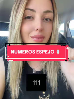 A selfie-style video cover featuring a woman with long blonde hair, light skin and a shirt. She is looking at the camera with a neutral expression. The background is blurred, appearing to be the interior of a car with seat visible. A red and black banner with the text "NUMEROS ESPEJO" covers a portion of her face. At the bottom, a solid black rectangle with the number 111 is visible.