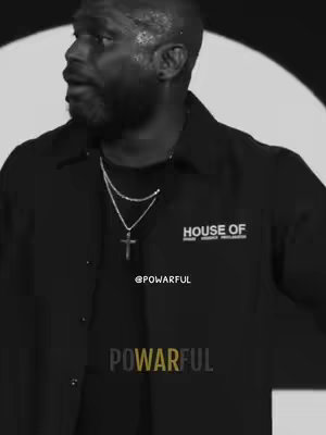 A grayscale image featuring a Black man in a black shirt with a cross necklace. The top left shows the man looking to the side with a serious expression. In the bottom center is the text "POWERFUL". The background has a white circular area. On the shirt "HOUSE OF" is readable.