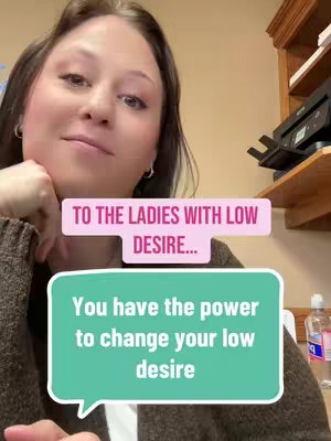 A woman is in a selfie-style shot. She has brown hair and is wearing a brown sweater. Two text boxes are overlaid on the image in pink and green, with both containing text related to desire and empowerment.