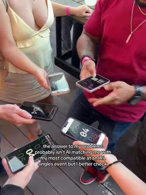A group of people holding smartphones in a circle, displaying numbers in a dating app interface or similar. The composition is from an overhead angle, with hands and arms filling the frame.