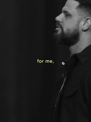 A black and white image featuring a man in profile. The man has short, dark hair and a well-groomed beard. He is wearing a dark jacket. The background is a solid dark gray or black. A yellow text overlay reads, "for me,"