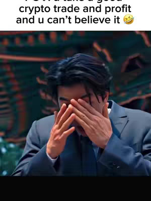 A man in a suit is shown with his hands covering his face, as if in disbelief or frustration. The background shows elements of a professional or corporate setting.