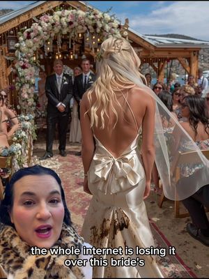 The cover image shows a wedding scene with a bride in the center, her back to the camera, wearing a white gown with a noticeable stain on the lower back. A woman is in the foreground, partially obscuring the wedding scene, with a surprised expression. The layout is a split screen.