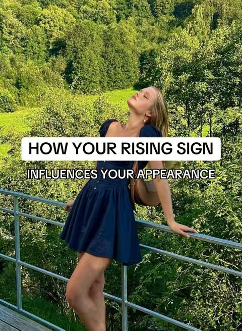 A woman leans against a metal railing, with a forested background. She gazes upward with her eyes closed and a slight smile. She is wearing a dark blue dress. Text overlays the image, which is framed in a way that balances the natural scenery and the figure.