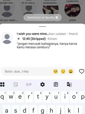 The cover image displays a mobile phone screen showing a message interface. The message reads "I wish you were mine..." followed by a song title "12:45 (Stripped) - Etham" and a quote in Indonesian. The phone's keyboard is visible at the bottom of the screen.