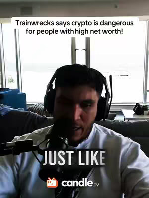 A man with headphones is centered in the frame, speaking into a microphone. Text overlays the image, and behind him is a window with a view.