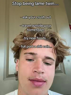 A young man with fair skin and light brown, wavy hair is shown from the chest up. The background appears to be an interior space. Overlaid on the image is white text in a sans-serif font, listing various suggestions such as "ask your crush out" and "travel outside your hometown". Below those suggestions are a list of the different things to do. The man is gazing at the camera with a neutral expression. The overall composition has a casual, candid feel.