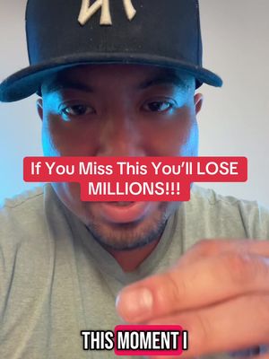 A close-up shot of a man wearing a black baseball cap and a gray shirt. Text overlays in red boxes read, "If You Miss This You'll LOSE MILLIONS!!!" and "THIS MOMENT I". The man appears to be speaking or pointing, and the lighting is cool-toned, with blue hues.