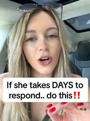 A woman with long blonde hair, sunglasses on her head, is positioned in the front seat of a car. A text overlay sits in front of her. Her lips are slightly parted as if she is speaking. Her nails are painted red.