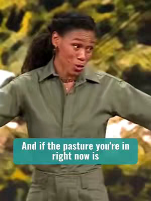 A woman looking at the camera with a thoughtful expression. She is wearing a green shirt and pants. A text box with white text on a blue background appears below. The background is a blurred green color, and is most likely the outdoors.
