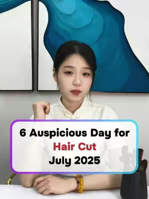 A woman sits at a desk, looking directly at the camera. Behind her are two abstract art pieces. A rectangular overlay displays text that reads: "6 Auspicious Day for Hair Cut July 2025."